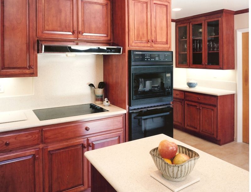 dark cherry cabinets, light counter tops, Campbell